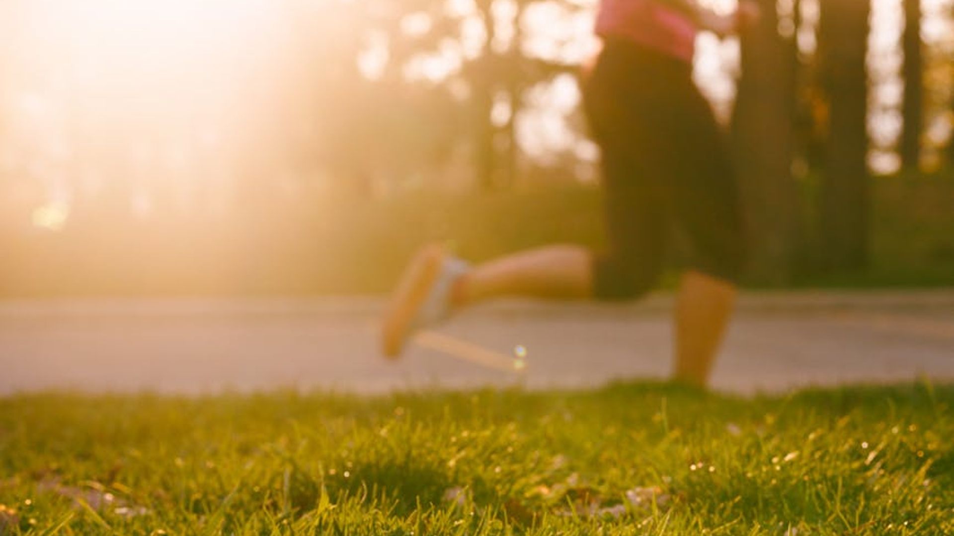 Person doing light cardio exercises at sunrise outdoor